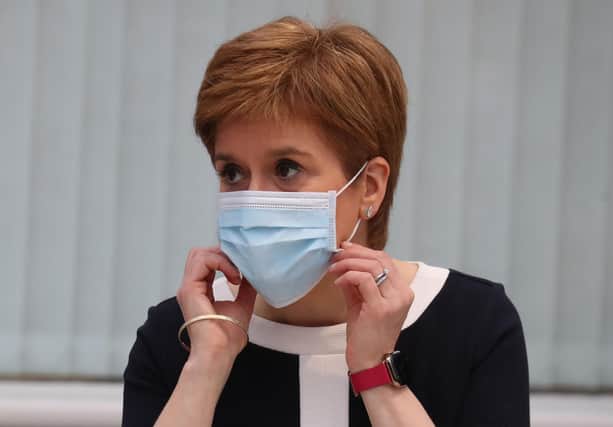 Nicola Sturgeon and health officials have repeatedly stressed the importance of wearing a facemask (Picture: Andrew Milligan/AFP via Getty Images)