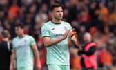 Former Hibs striker Mykola Kukharevych has signed a permanent contract with Swansea.