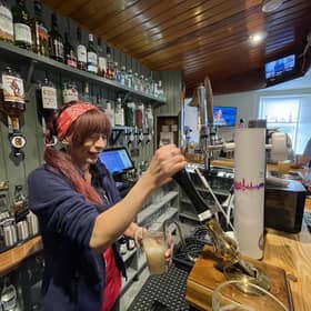 Pulling a pint at The Anchor Tavern in Port Bannantyne on the Isle of Bute, which is now in community ownership. PIC: Contributed.