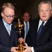 DP World Tour CEO Keith Pelley and Scott Crockett, the circuit's communications diretor, hold the Ryder Cup before a press conference in Rome. Picture: Paolo Bruno/Getty Images.