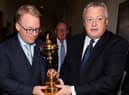 DP World Tour CEO Keith Pelley and Scott Crockett, the circuit's communications diretor, hold the Ryder Cup before a press conference in Rome. Picture: Paolo Bruno/Getty Images.