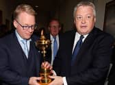 DP World Tour CEO Keith Pelley and Scott Crockett, the circuit's communications diretor, hold the Ryder Cup before a press conference in Rome. Picture: Paolo Bruno/Getty Images.