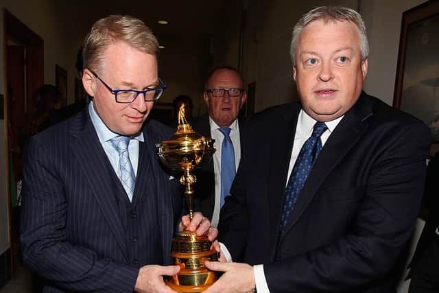 DP World Tour CEO Keith Pelley and Scott Crockett, the circuit's communications diretor, hold the Ryder Cup before a press conference in Rome. Picture: Paolo Bruno/Getty Images.