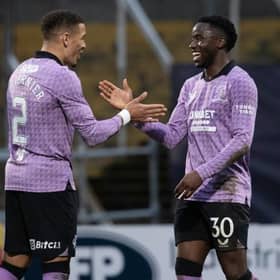 Fashion Sakala (right) is congratulated by James Tavernier after scoring Rangers' third goal in their 3-0 Scottish Cup quarter-final win at Dundee.  (Photo by Alan Harvey / SNS Group)