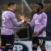 Fashion Sakala (right) is congratulated by James Tavernier after scoring Rangers' third goal in their 3-0 Scottish Cup quarter-final win at Dundee.  (Photo by Alan Harvey / SNS Group)