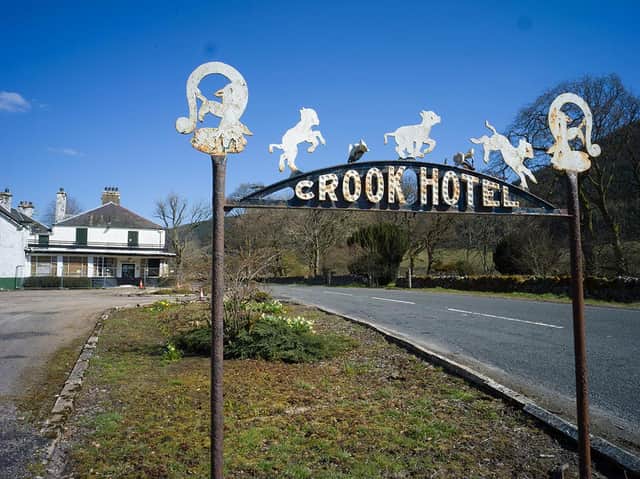 An old sign at the Crook Inn, Tweedsmuir, which will now soon dispense hospitality once again after a 15-year campaign by residents to save the pub for the community. PIC: Contributed.