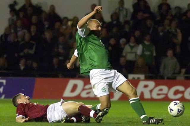 Mixu Paatelainen completes his hat-trick as Hibs go on to defeat city rivals Hearts 6-2. Photo by SNS Group