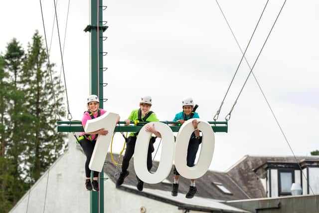 Scouting ambassadors Isla Simpson (16) from Fife, Roan MacRae (16) from Carluke and Sriram Bhaskar (13) from Kirkintilloch try out the new giant swing at Auchengillan Outdoor Centre as Scouts gather from across Scotland for one of the Centre’s largest ever jamborees to mark the start of its 100th year.
