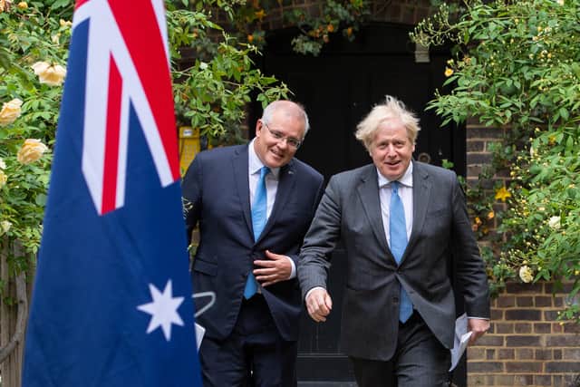 Boris Johnson and Australia's Prime Minister Scott Morrison, who has said he may not attend the Cop26 climate change summit (Picture: Dominic Lipinski/WPA/Getty Images)