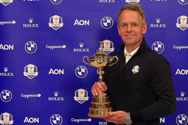 New European Ryder Cup captain Luke Donald poses with the trophy. Picture: Mike Ehrmann/Getty Images.