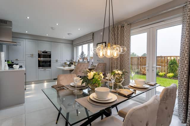 The open-plan kitchen and dining area of the Victoria opens up to the garden