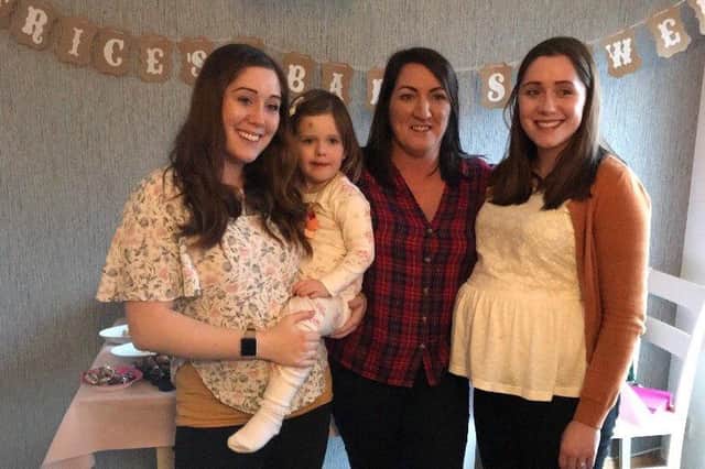 Amanda Jane Telfer with twin daughters Trisha Williams and Patrice Keogh and granddaughter Amelia Keogh, 4.