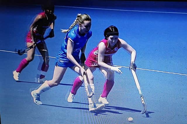 Bronwyn Shields jousts for the ball in Santiago with a Japanese player