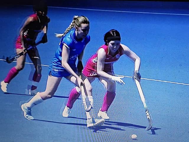 Bronwyn Shields jousts for the ball in Santiago with a Japanese player