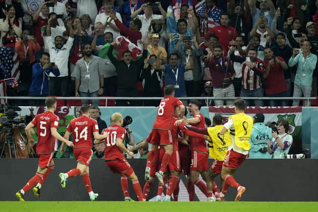 Wales players celebrate after Gareth Bale scored their side's equaliser from the penalty spot.