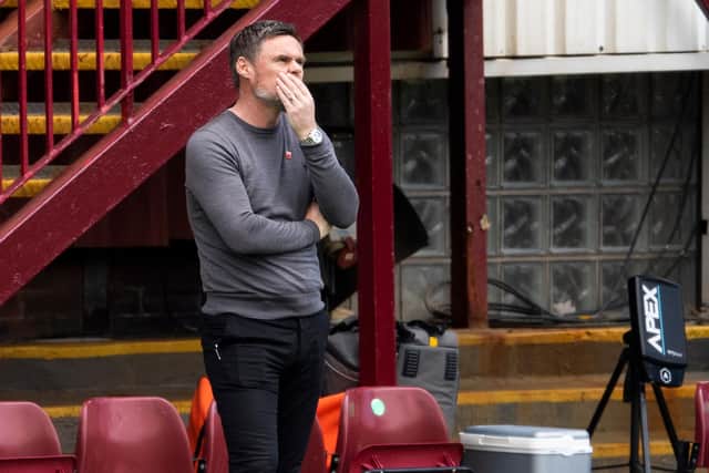 Motherwell manager Graham Alexander cuts a frustrated figure on the sidelines at Fir Park. Picture: SNS