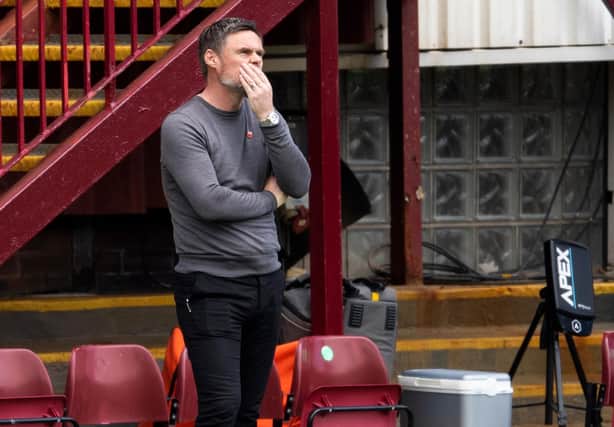 Motherwell manager Graham Alexander cuts a frustrated figure on the sidelines at Fir Park. Picture: SNS