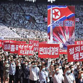 A mass rally in Pyongyang, North Korea, to make the 'Day of Struggle Against US imperialism' last year (Picture: Kim Won Jin/AFP via Getty Images)