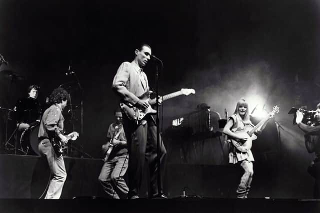 Talking Heads on stage at the The Hollywood Pantages Theatre during the filming of Stop Making Sense. Picture:Cinecom Int'/Island Alive/Kobal/Shutterstock