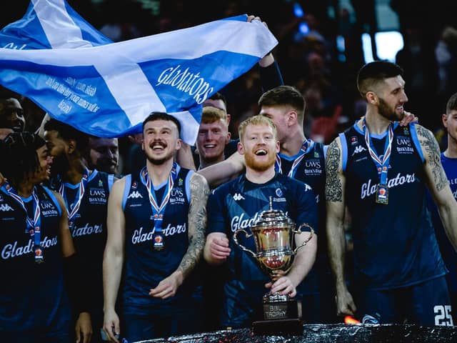 Caledonia Gladiators celebrate with the BBL Trophy after beating Cheshire Phoenix in the final.  Picture: British Basketball League