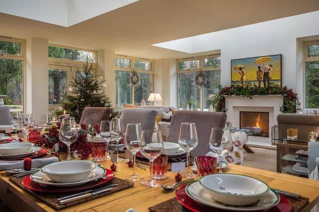 The extensive lounge dining area, dressed for the holiday season.