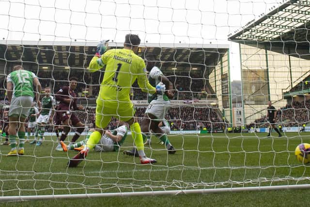 Josh Ginnelly opened the scoring with this early strike for Hearts.