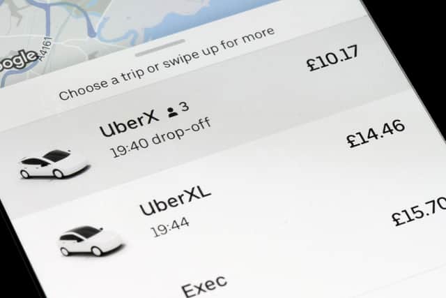 The Uber ruling means drivers are now entitled to earn the minimum wage and receive paid holiday. (Photo illustration: Matthew Horwood/Getty Images)