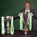 Departed Celtic manager Ange Postecoglou with the three Scottish trophies - Premiership, League Cup and Scottish Cup - after landing a domestic treble. (Photo by Craig Williamson / SNS Group)