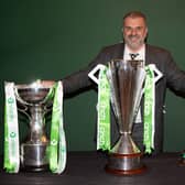 Departed Celtic manager Ange Postecoglou with the three Scottish trophies - Premiership, League Cup and Scottish Cup - after landing a domestic treble. (Photo by Craig Williamson / SNS Group)