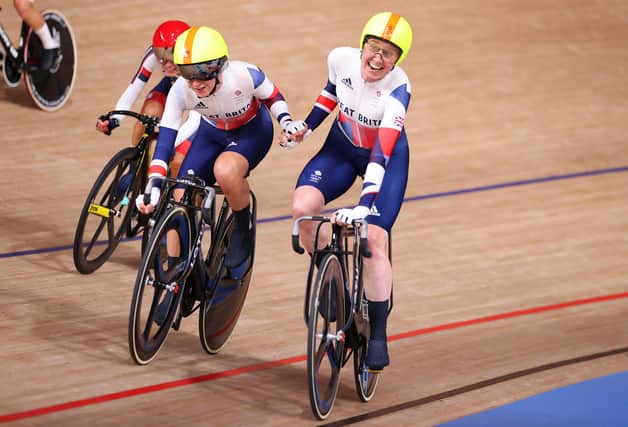 Joy on the faces of Katie Archibald, right, and Laura Kenny as they celebrate winning gold in the women's Madison final of the track cycling in Tokyo. Picture: Justin Setterfield/Getty Images
