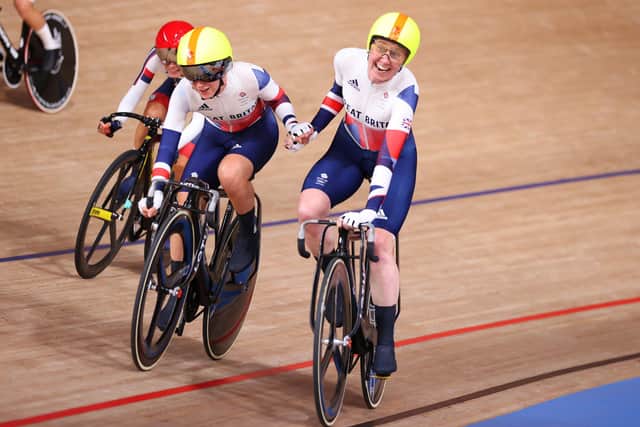 Joy on the faces of Katie Archibald, right, and Laura Kenny as they celebrate winning gold in the women's Madison final of the track cycling in Tokyo. Picture: Justin Setterfield/Getty Images