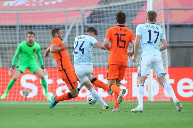 Jack Hendry strikes the opener for Scotland in the 2-2 draw with the Netherlands in Faro (Photo by Fran Santiago/Getty Images)