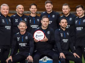 Rangers boss Michael Beale poses with the cinch Premiership Manager of the Month award for December alongside his backroom staff. (Photo by Rob Casey / SNS Group)