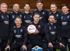 Rangers boss Michael Beale poses with the cinch Premiership Manager of the Month award for December alongside his backroom staff. (Photo by Rob Casey / SNS Group)