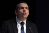 Scottish Conservative party leader Douglas Ross delivers a keynote speech on the first day of the Scottish Conservative party conference at the Scottish Event Campus (SEC) in Glasgow
