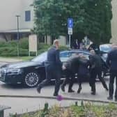 Security personnel carry Slovakia's Prime Minister Robert Fico towards a vehicle after he was shot on Wednesday (Picture: RTVS/AFP via Getty Images)