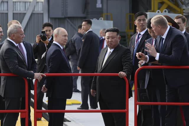 Russian president Vladimir Putin and North Korea's leader Kim Jong-Un examine a launch pad during their meeting at the Vostochny cosmodrome outside the city of Tsiolkovsky. Picture: Mikhail Metzel, Sputnik, Kremlin Pool Photo via AP