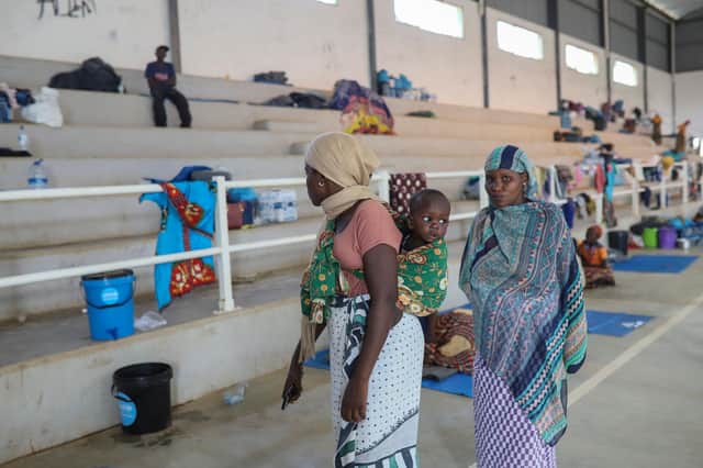 Displaced women from Palma are seen at the Pemba Sports center on April 2 where people were evacuated from the coasts of Palma after armed insurgents attacked the city on March 24. (Getty Images)