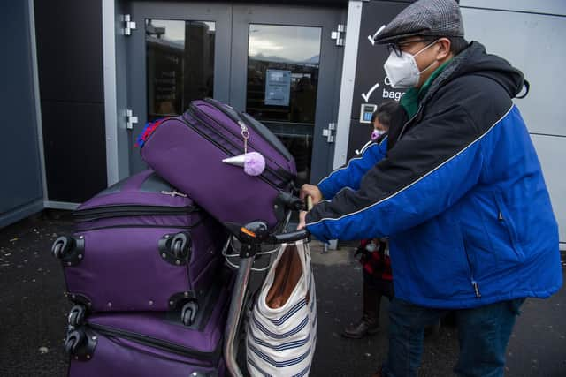 Chun Wong and daughter Kiernan, 8, were the first passengers to go into quarantine hotels in Scotland.