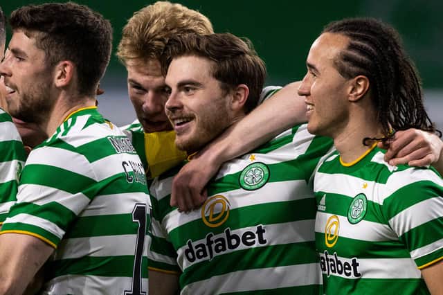 James Forrest, centre, was on target for Celtic against Falkirk.