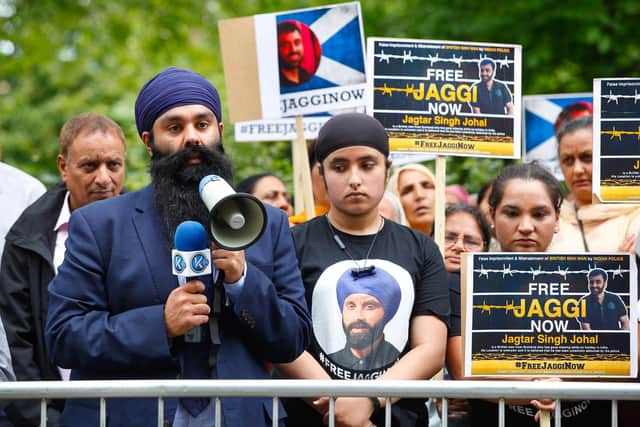 Gurpreet Singh Johal holding a protest outside the London-based India Consultate on behalf of his brother Jagtar Singh Johal in 2018.