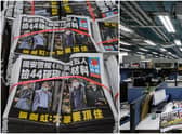 Copies of the Apple Daily newspaper are seen stacked in Hong Kong, after police arrested the chief editor and four executives of the pro-democracy newspaper (Getty Images)