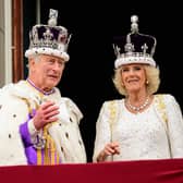King Charles III and Queen Camilla on the balcony of Buckingham Palace, London, following the coronation.