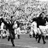 Tony Stanger celebrates Scotland's famous win over England in the 1990 Grand Slam decider at Murrayfield. Picture: Alan MacDonald