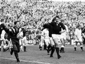 Tony Stanger celebrates Scotland's famous win over England in the 1990 Grand Slam decider at Murrayfield. Picture: Alan MacDonald