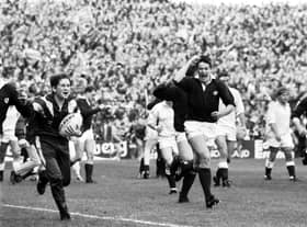 Tony Stanger celebrates Scotland's famous win over England in the 1990 Grand Slam decider at Murrayfield. Picture: Alan MacDonald