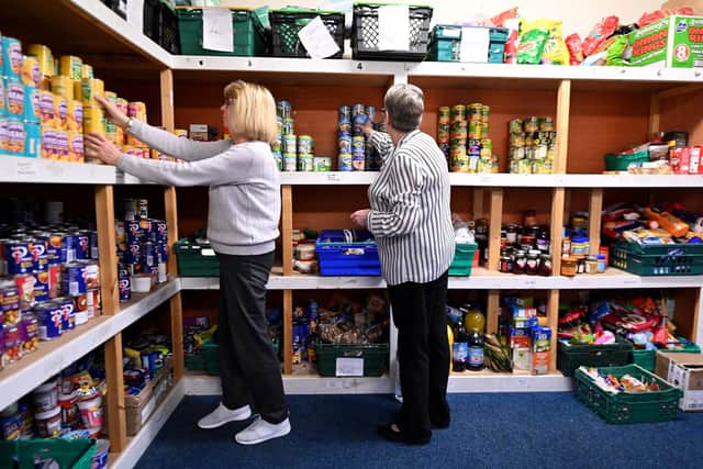 Giving to any charity, for instance foodbanks, above, allows it to claim an extra 25p for every £1 you give.