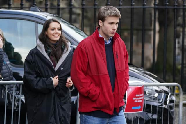 Actors Ed McVey, as Prince William and actress Meg Bellamy, who plays Kate Middleton in between filming scenes for the next season of The Crown in St Andrews, Scotland.