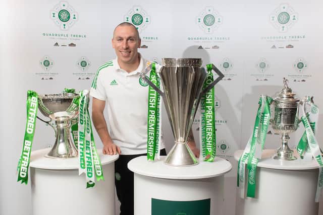 Scott Brown with the spoils that marked Celtic's historic quadruple treble in which he was an integral performer, following the club's Scottish Cup final success in December that earned a 12th straight honour. (Photo by Craig Foy / SNS Group)