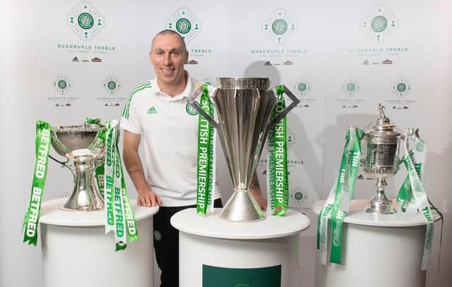 Scott Brown with the spoils that marked Celtic's historic quadruple treble in which he was an integral performer, following the club's Scottish Cup final success in December that earned a 12th straight honour. (Photo by Craig Foy / SNS Group)